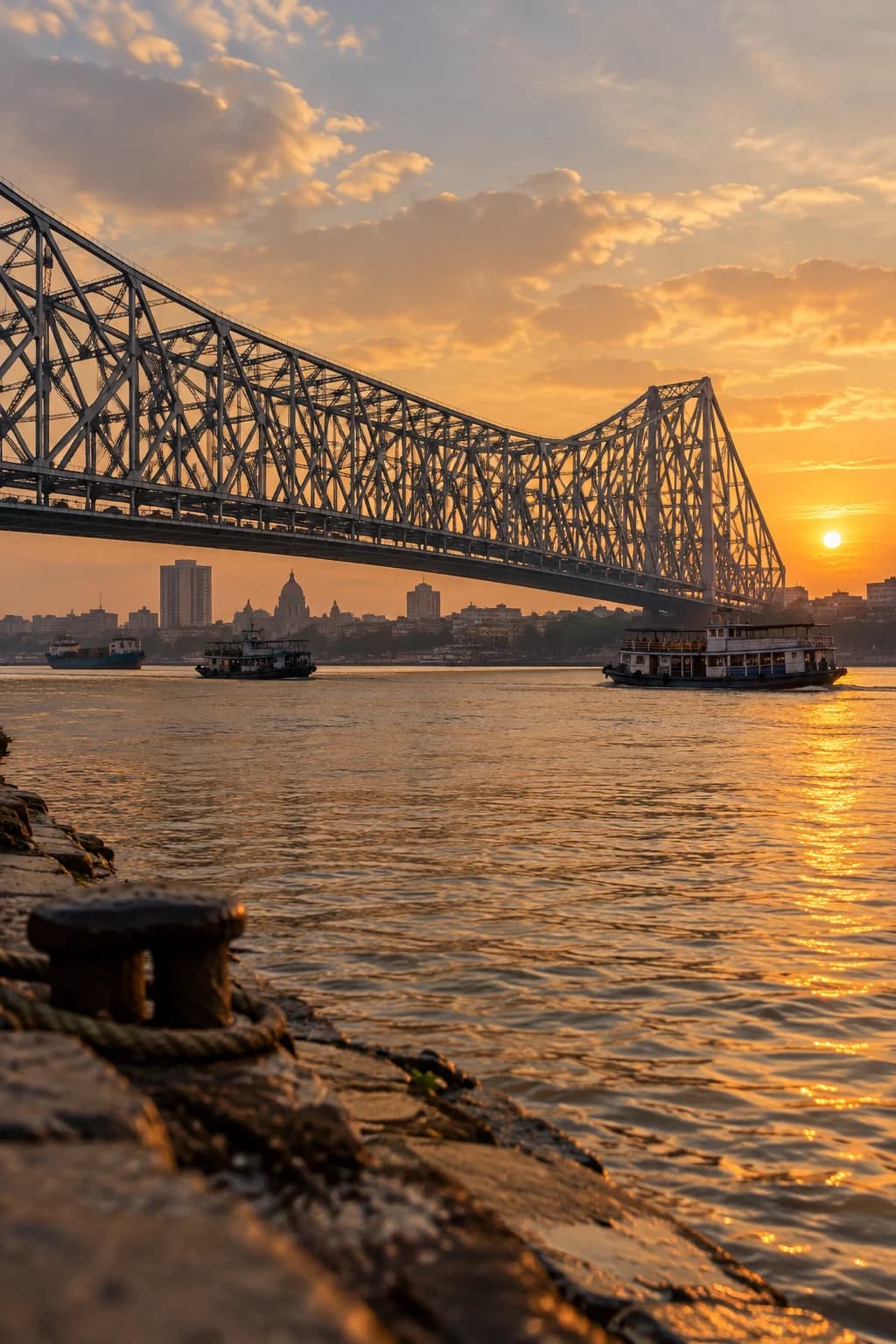 Howrah Bridge over the Hooghly River at golden hour, Kolkata